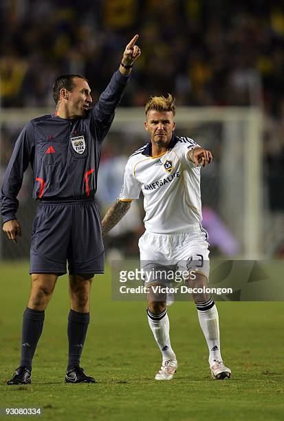 David Beckham of the Los Angeles Galaxy disputes the placement of the ball for the free kick with match referee Terry Vaughn during the MLS Western...