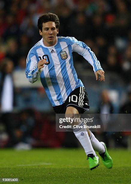 Lionel Messi of Argentina in action during the friendly International football match Spain against Argentina at the Vicente Calderon stadium in...