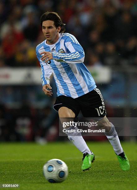 Lionel Messi of Argentina in action during the friendly International football match Spain against Argentina at the Vicente Calderon stadium in...