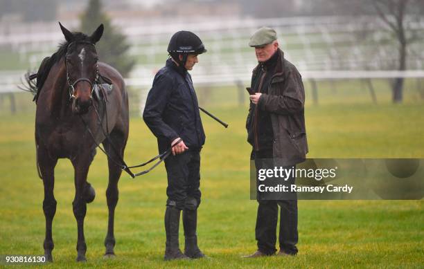 Cheltenham , United Kingdom - 12 March 2018; Trainer Willie Mullins with jockey Ruby Walsh and Benie Des Dieux on the gallops ahead of the Cheltenham...