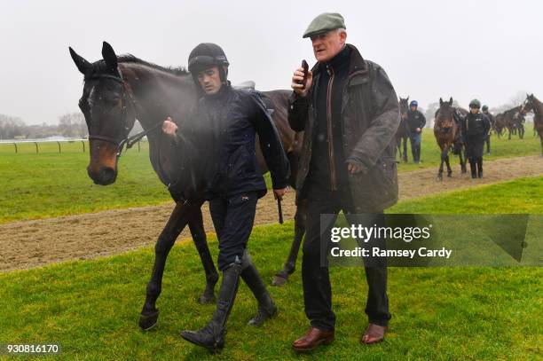 Cheltenham , United Kingdom - 12 March 2018; Trainer Willie Mullins with jockey Ruby Walsh and Benie Des Dieux on the gallops ahead of the Cheltenham...