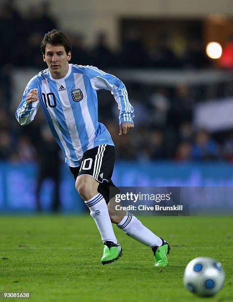 Lionel Messi of Argentina in action during the friendly International football match Spain against Argentina at the Vicente Calderon stadium in...