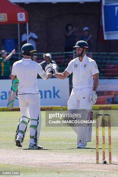 South Africa batsman Theunis de Bruyn and Proteas captain Faf du Plessis shake hands after winning during day four of the second Cricket Test match...