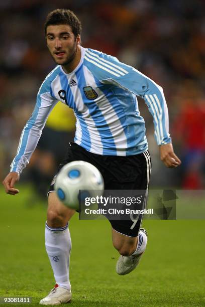 Gonzalo Higuain of Argentina in action during the friendly International football match Spain against Argentina at the Vicente Calderon stadium in...