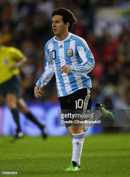 Lionel Messi of Argentina in action during the friendly International football match Spain against Argentina at the Vicente Calderon stadium in...