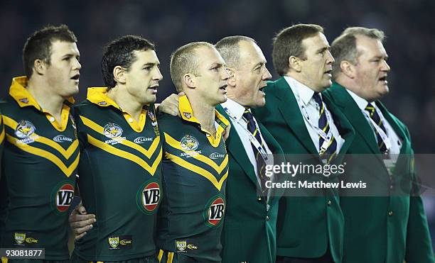 Brett Morris, Billy Slater, Darren Lockyer and Tim Sheens of the VB Kangaroos Australia Rugby League Team sing the Nation Anthem during the Four...