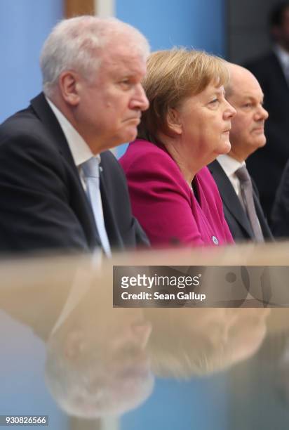 German Chancellor and Chairwoman of the German Christian Democrats Angela Merkel , Acting Chairman of the German Social Democrats Olaf Scholz and...