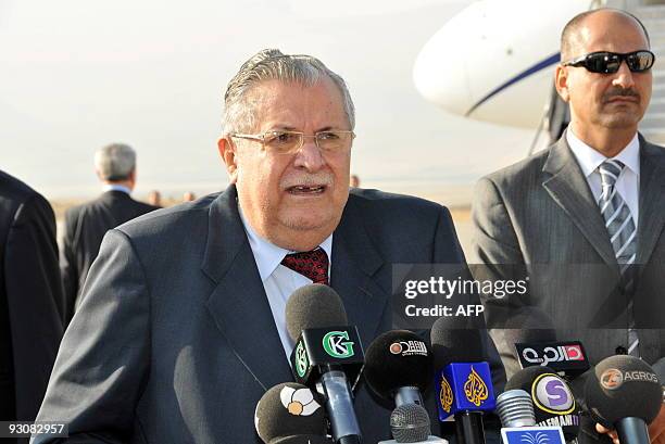 Iraqi president Jalal Talabani speaks to the press prior to boarding an aeroplane to France, on November 16 in the northern city of Sulaimaniyah, 270...