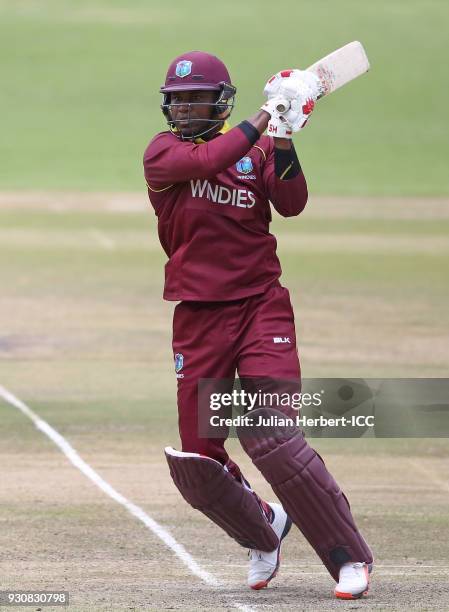 Marlon Samuels of The West Indies scores runs during The ICC Cricket World Cup Qualifier between The West Indies and The Netherlands at The Harare...