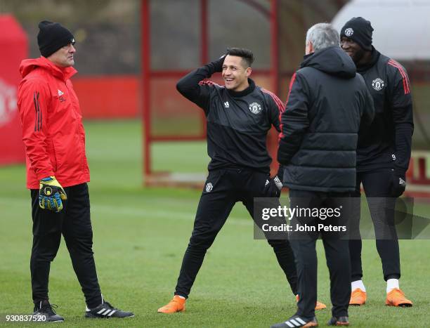 Alexis Sanchez, Romelu Lukaku and Manager Jose Mourinho of Manchester United in action during a first team training session at Aon Training Complex...