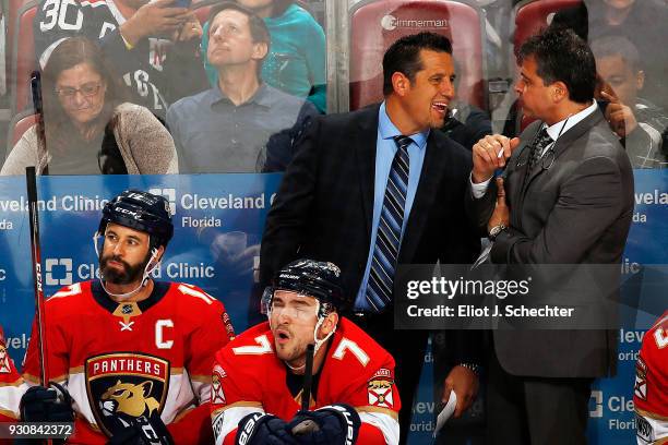 Florida Panthers Head Coach Bob Boughner chats with Associate Coach Jack Capuano during a break in the action against the New York Rangers at the...