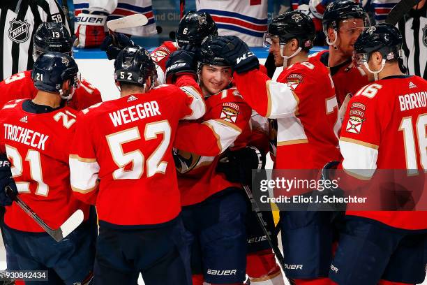 Frank Vatrano of the Florida Panthers is swarmed by teammates after contributing a goal earlier in their shoot out win against the New York Rangers...