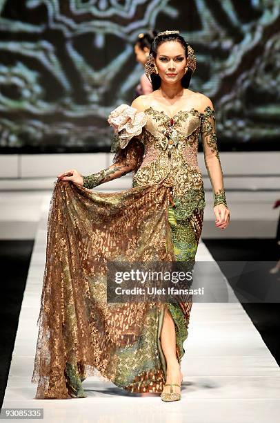 Model showcases designs on the runway by Anne Avantie as part of APPMI Show 4 on day three of Jakarta Fashion Week 2009 at the Fashion Tent, Pacific...