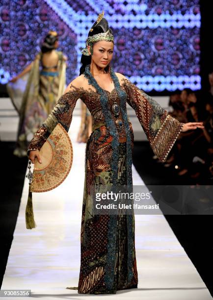 Model showcases designs on the runway by Anne Avantie as part of APPMI Show 4 on day three of Jakarta Fashion Week 2009 at the Fashion Tent, Pacific...