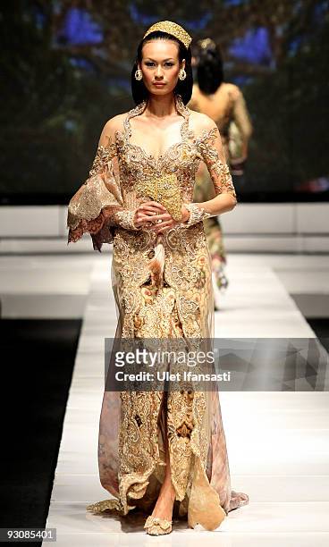 Model showcases designs on the runway by Anne Avantie as part of APPMI Show 4 on day three of Jakarta Fashion Week 2009 at the Fashion Tent, Pacific...