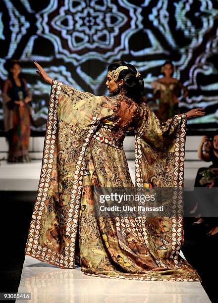 Model showcases designs on the runway by Anne Avantie as part of APPMI Show 4 on day three of Jakarta Fashion Week 2009 at the Fashion Tent, Pacific...