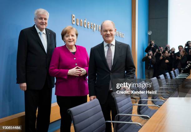 German Chancellor and Chairwoman of the German Christian Democrats Angela Merkel , Acting Chairman of the German Social Democrats Olaf Scholz and...