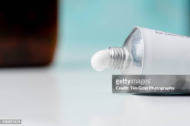 a tube of hydrocortisone cream - steroids stock pictures, royalty-free photos & images