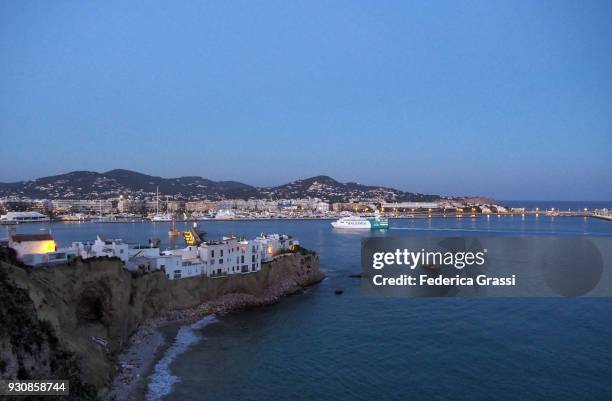 balearia ferry boat entering the ibiza harbor - balearia stock pictures, royalty-free photos & images
