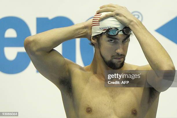 Michael Phelps of the US prepares to compete in the heats of the Men's 200m Butterfly at the FINA/ARENA Swimming World Cup 2009 in Berlin November...