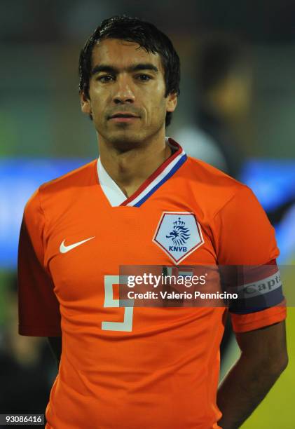 Giovanni van Bronckhorst of Holland lines up for the anthems prior to kickoff during the international friendly match between Italy and Holland at...