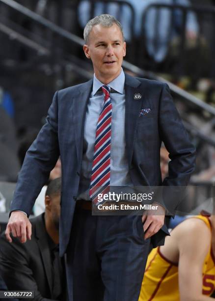 Head coach Andy Enfield of the USC Trojans looks on during a quarterfinal game of the Pac-12 basketball tournament against the Oregon State Beavers...