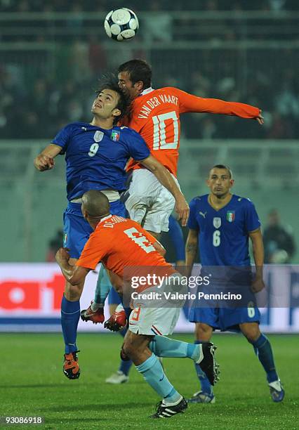 Alberto Gilardino of Italy clashes with Rafael van der Vaart of Holland during the international friendly match between Italy and Holland at...
