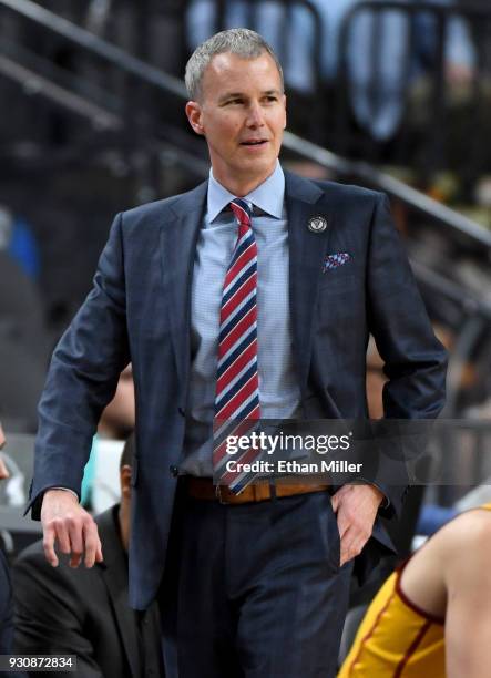 Head coach Andy Enfield of the USC Trojans looks on during a quarterfinal game of the Pac-12 basketball tournament against the Oregon State Beavers...