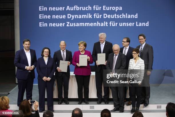 German Chancellor and Chairwoman of the German Christian Democrats Angela Merkel , Acting Chairman of the German Social Democrats Olaf Scholz and...