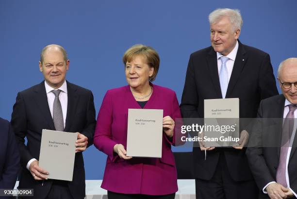 German Chancellor and Chairwoman of the German Christian Democrats Angela Merkel , Acting Chairman of the German Social Democrats Olaf Scholz and...