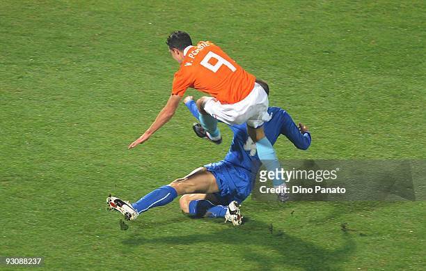 Giorgio Chiellini of Italy and Robin Van Persie of Holand an injury during the International Friendly Match between Italy and Holland at Adriatico...
