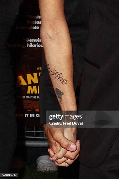Hands of George Clooney and Elisabetta Canalis at the Opening Gala for The Times BFI London Film Festival which Premiere's 'Fantastic Mr Fox' at the...