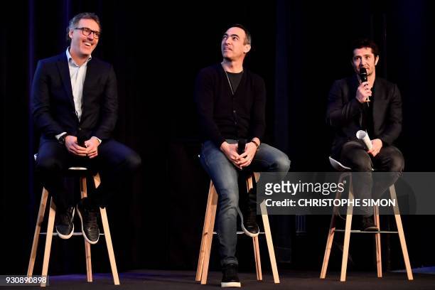 Soccer World Cup champions, Youri Djorkaeff , Laurent Blanc and Bixente Lizarazu speak during a press conference on March 12, 2018 at French private...