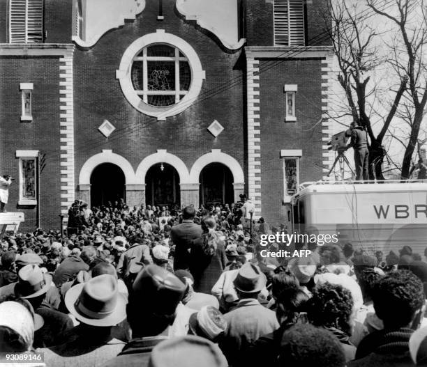 Civil rights demonstrators, led by Dr Martin Luther King , arrive in front of the Brown Chapel AME Church in Montgomery from Selma on March 26, 1965...
