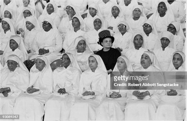 View of female Nation of Islam attendees of the Saviour's Day celebrations, Chicago, Illinois, mid 1960s.