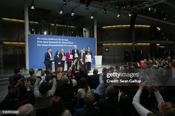 German Chancellor and Chairwoman of the German Christian Democrats Angela Merkel , Acting Chairman of the German Social Democrats Olaf Scholz and...