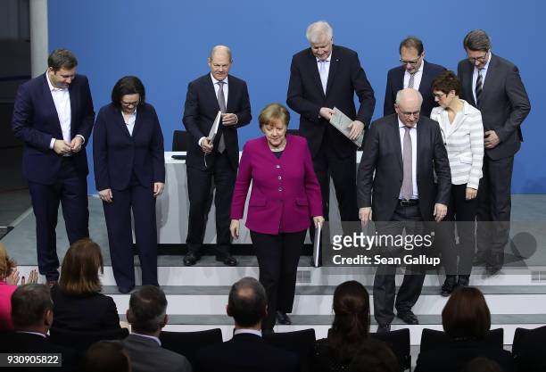 German Chancellor and Chairwoman of the German Christian Democrats Angela Merkel , Acting Chairman of the German Social Democrats Olaf Scholz and...