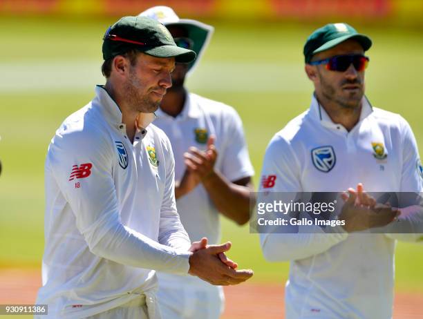 De Villiers of South Africa and Faf du Plessis of South Africa acknowledges Kagiso Rabada of South Africa after 2nd Sunfoil Test match between South...