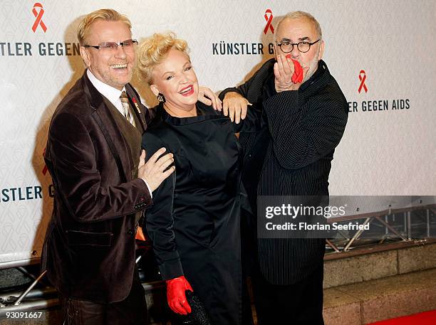 Rene Koch and musical singer Angelika Milster and Udo Walz attend the AIDS Gala 2009 at theater des Westen on November 16, 2009 in Berlin, Germany.