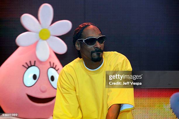 Rapper Snoop Dogg and character Foofa perform onstage during the Yo Gabba Gabba! : "There's A Party In My City" Live at The Shrine Auditorium on...