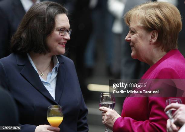 German Chancellor and Chairwoman of the German Christian Democrats Angela Merkel, chats with Andrea Nahles, , Leader of the SPD and chief of the...