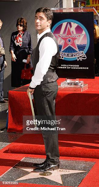 Actor John Stamos attends the ceremony honoring him with a star on the Hollywood Walk of Fame on November 16, 2009 in Hollywood, California.
