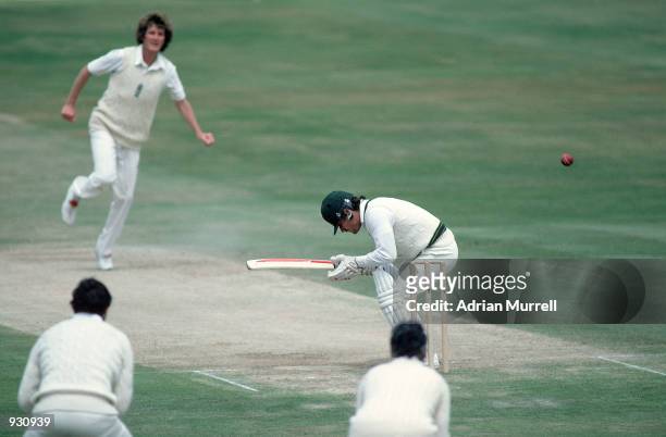 Allan Border of Australia ducks a bouncer from Bob Willis of England during the Third Ashes Test match between England and Australia at Headingley in...