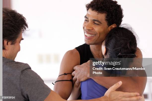 Cuban dancer Carlos Acosta shares a laugh with Russian ballet teacher Sergei Polunin as he hugs Tamara Rojo from Spain, while the Royal ballet...