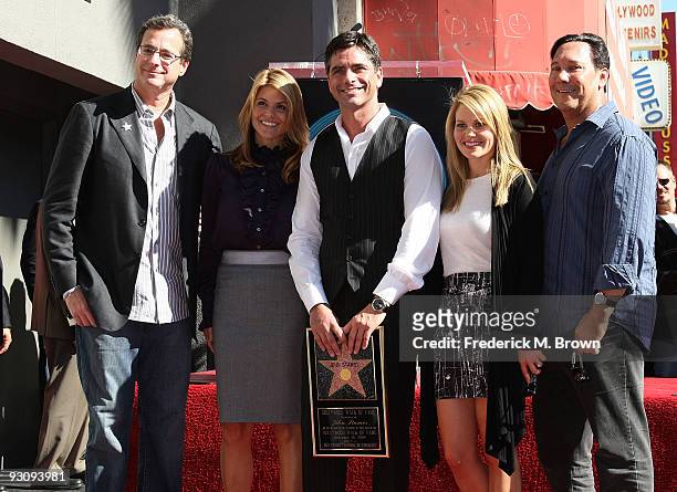 Comedian Bob Saget, producer Lori Laughlin, actor John Stamos, actress Candice Bure and Jeff Franklin pose during induction ceremony on the Hollywood...