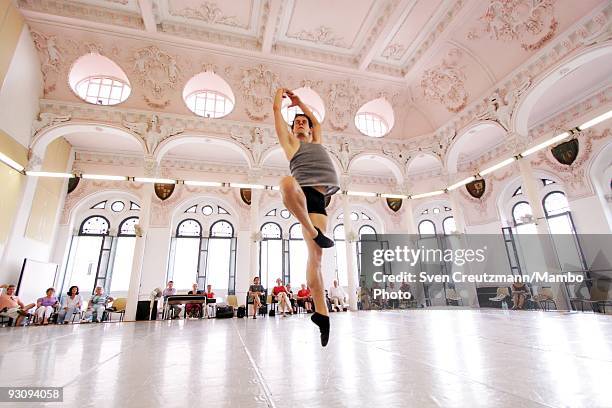 Cuban dancer Joel Carreno, invited by the Royal Ballet, jumps during reahearsals on July 15 in Havana, Cuba. With its first visit to Cuba, the Royal...