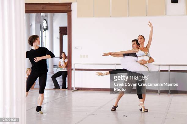Ballet teacher Sergei Polunin teaches Alexander Agadzhanov of the Royal Ballet and invited Cuban dancer Arrencibia during rehearsal on July 15 in...