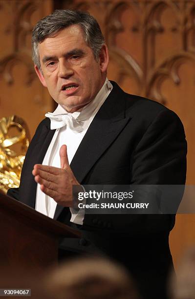 Britain's Prime Minister Gordon Brown delivers a speech as he attends the City of London Lord Mayor's Banquet at the Guildhall, in central London, on...