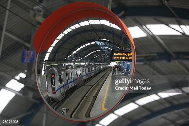 A new metro train is reflected in a mirror prior to its flagging off... News Photo - Getty Images A new metro train is reflected in a mirror prior to its flagging off... News Photo - Getty Images