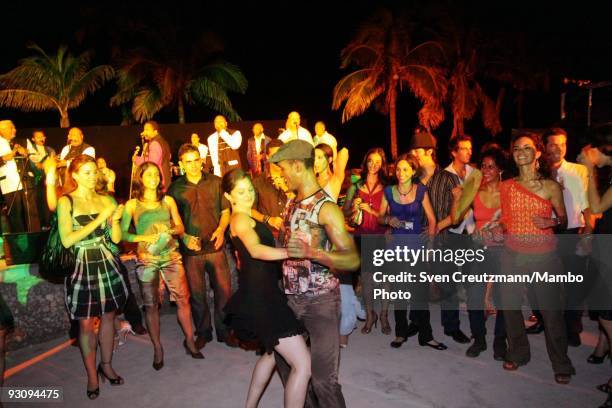 Dancers aof the Royal Ballet of London and Cubans dance at the beach of the Club Habana after the last performance of "Manon" at the Karl Marx...